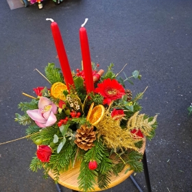 Christmas celebration candle table arrangement